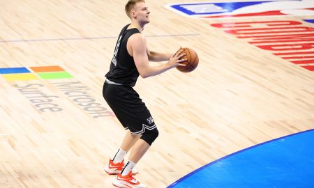 Syracuse basketball alumni Buddy Boeheim shoots a three pointer